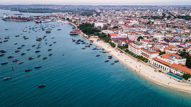 Aerial view of the Stone Town seafront, harbour and moored boats